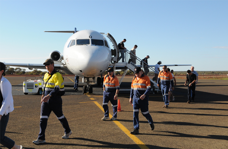 FIFO Staff boarding charter aircraft